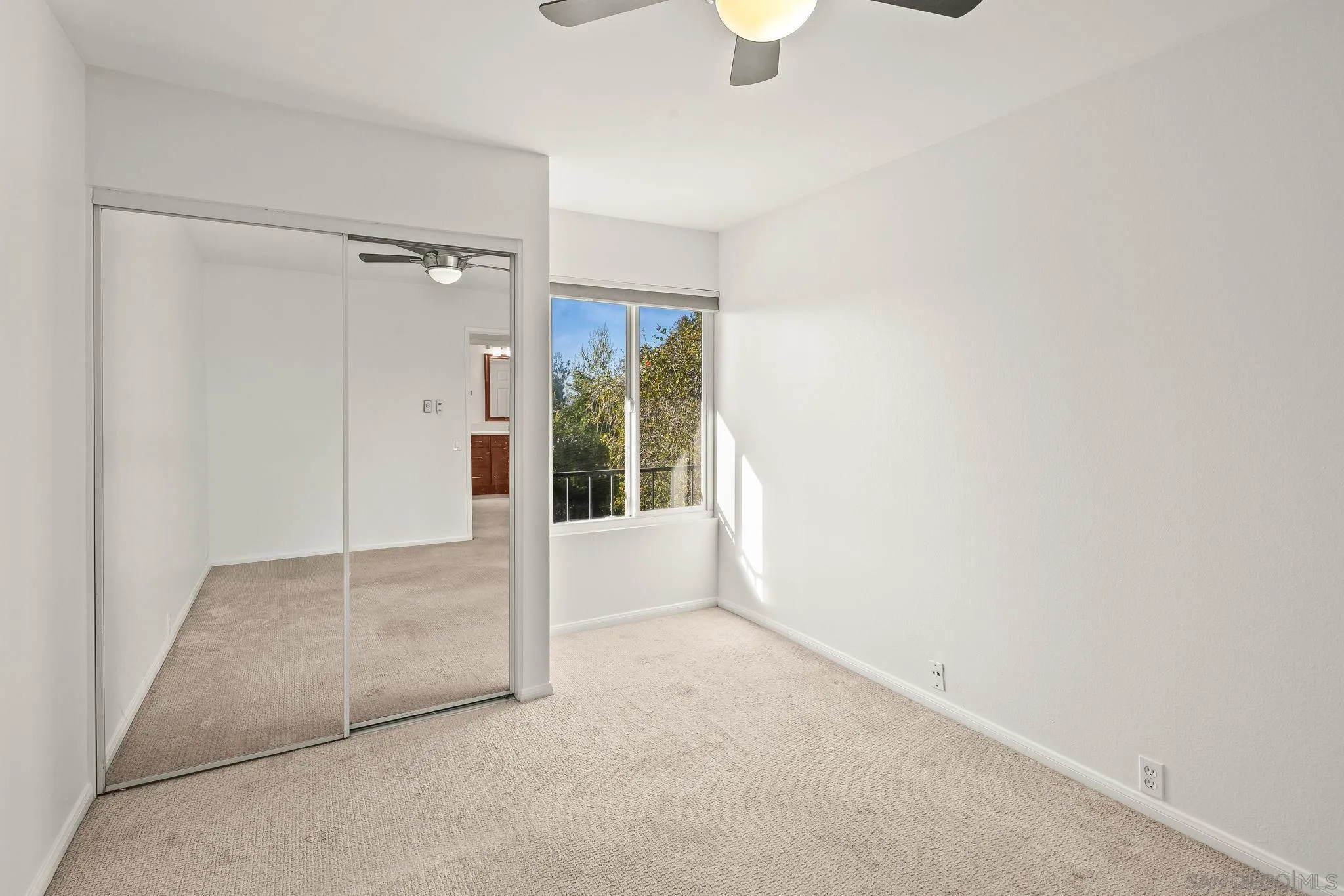 9679 Easter Way San Diego, CA 92121 - Photo 16 of 28 a view of an empty room and window