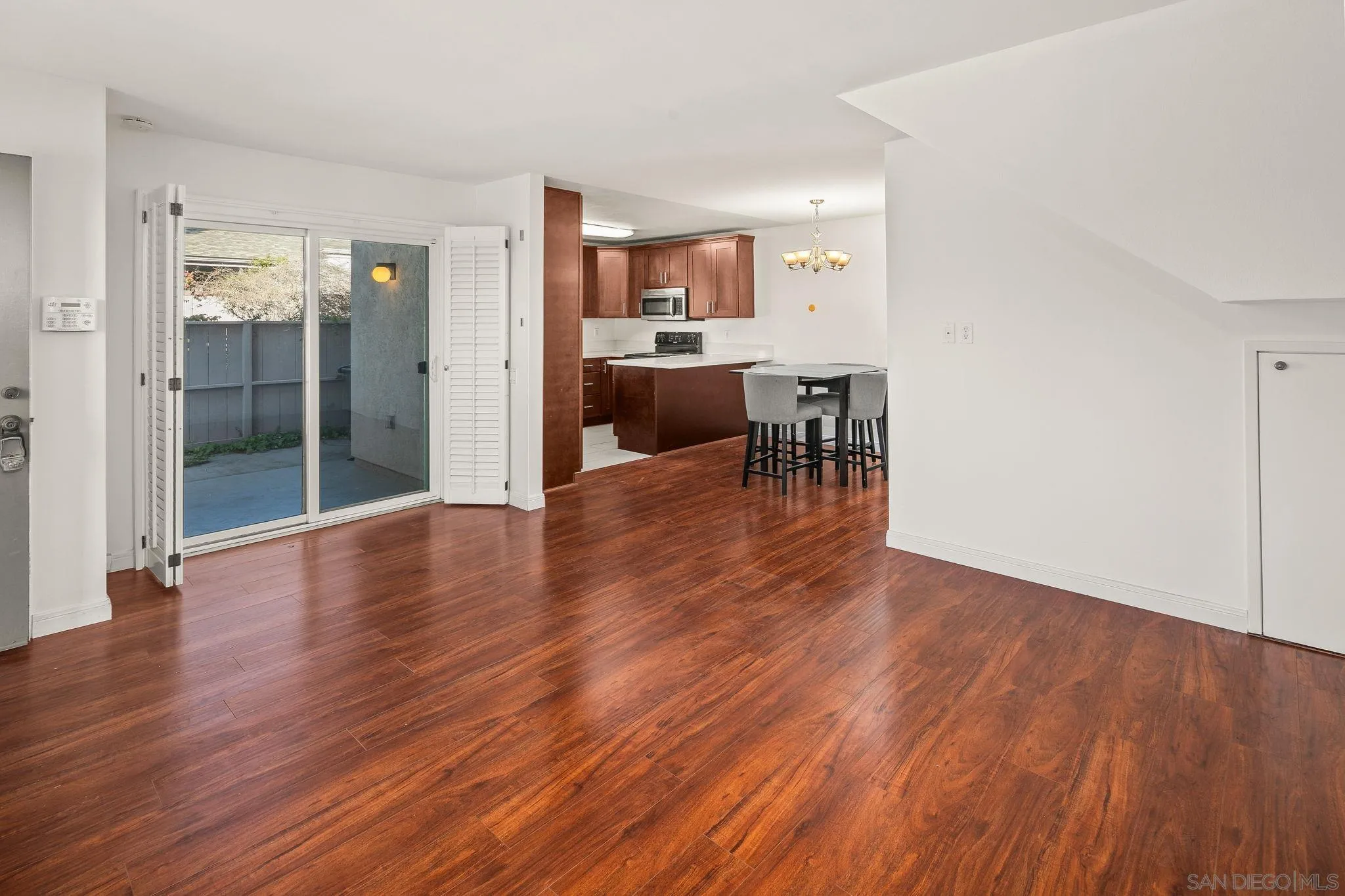 9679 Easter Way San Diego, CA 92121 - Photo 5 of 28 a view of a living room and dining room