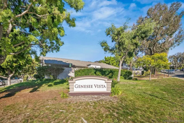 a view of kitchen and dining room with wooden floor