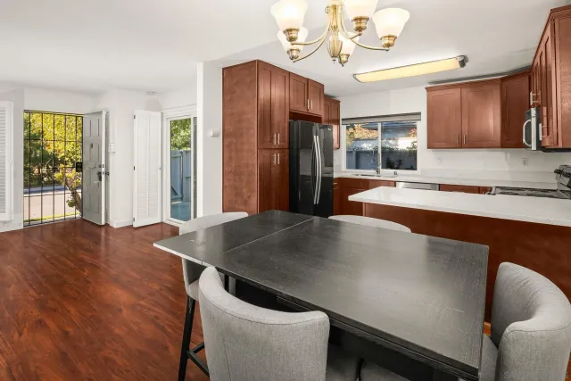 a kitchen with a stove and a microwave