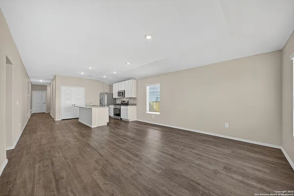 a view of kitchen with wooden floor