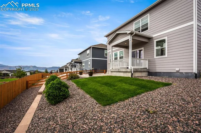 a view of a back yard of the house