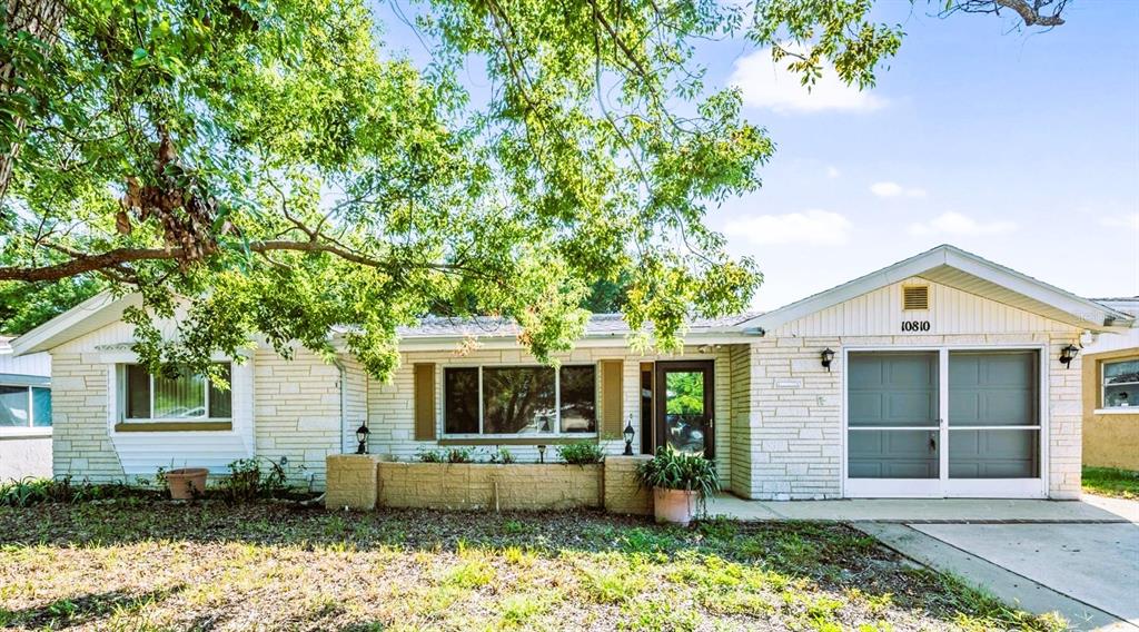 10810 Leeds Road Port Richey, FL 34668 - Photo 1 of 1 AWESOME, AFFORDABLE HOME - great investment whether it's your primary home or investment home!! (photo taken before NEW ROOF installed)