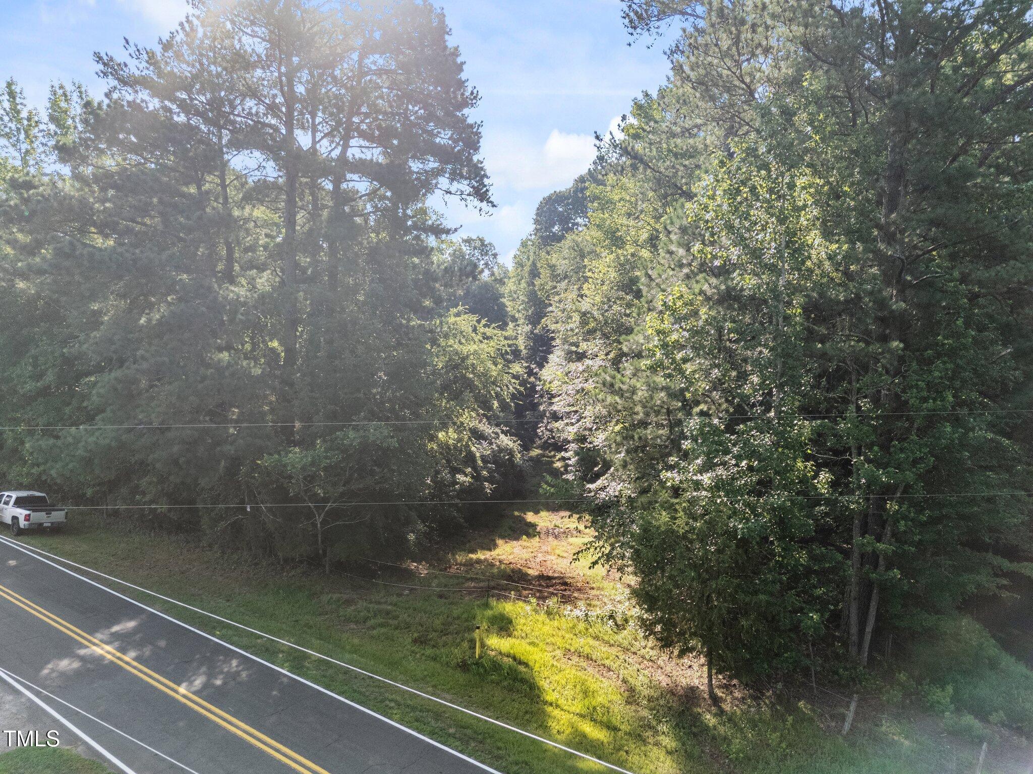 4710 Dorsey Road Oxford, NC 27565 - Photo 14 of 27 a view of a yard from a window