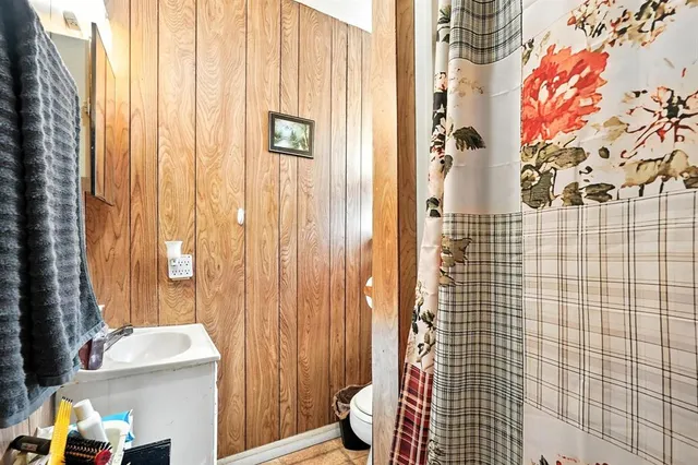 a bedroom with a bed and a closet