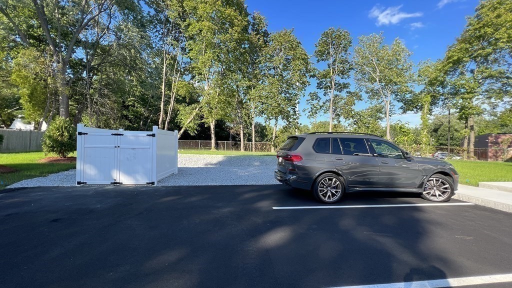 336 Cambridge Street, Unit A Burlington, MA 01803 - Photo 16 of 17 a car parked in the back of a house