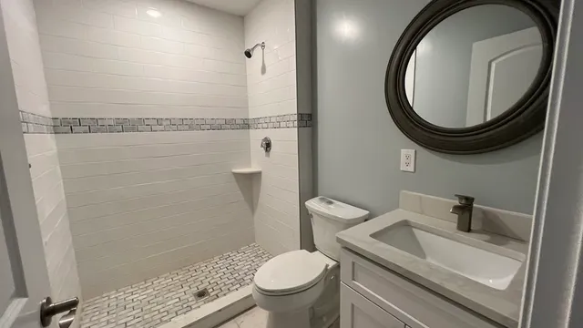 a bathroom with a toilet and a sink