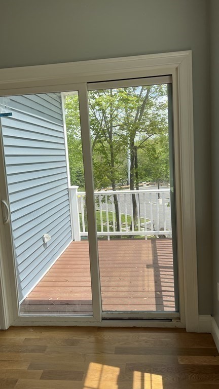 336 Cambridge Street, Unit A Burlington, MA 01803 - Photo 6 of 17 a view of a balcony and window