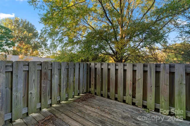 a view of a wooden fence