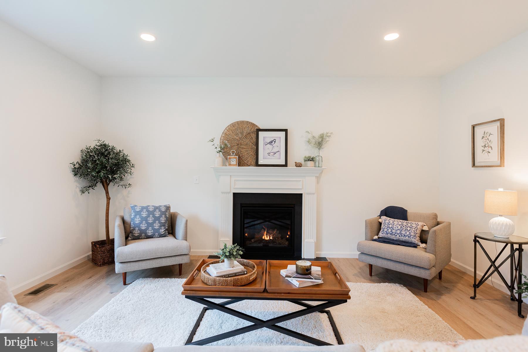 10 Ridgewood Road Quarryville, PA 17566 - Photo 13 of 48 a living room with furniture and a fireplace