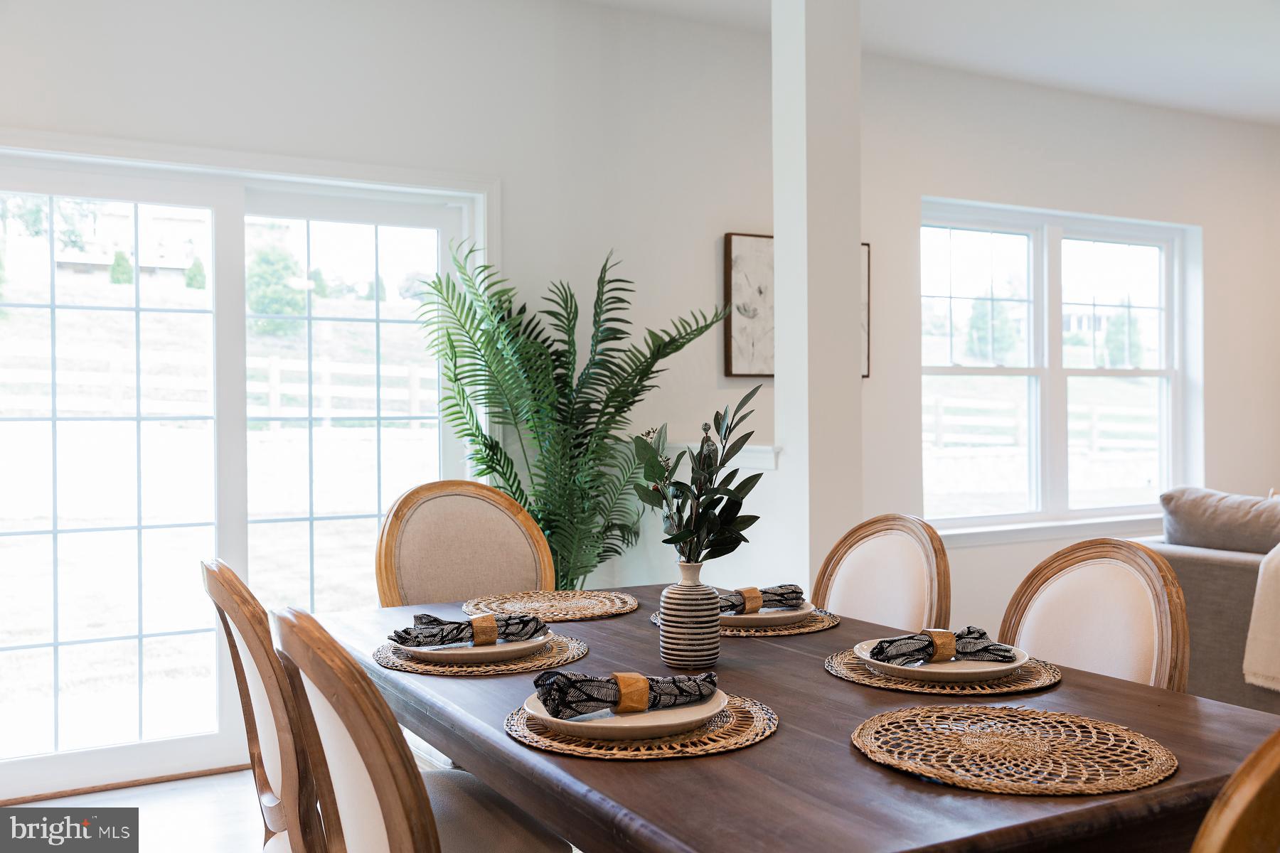 10 Ridgewood Road Quarryville, PA 17566 - Photo 23 of 48 a table with a table and a potted plant