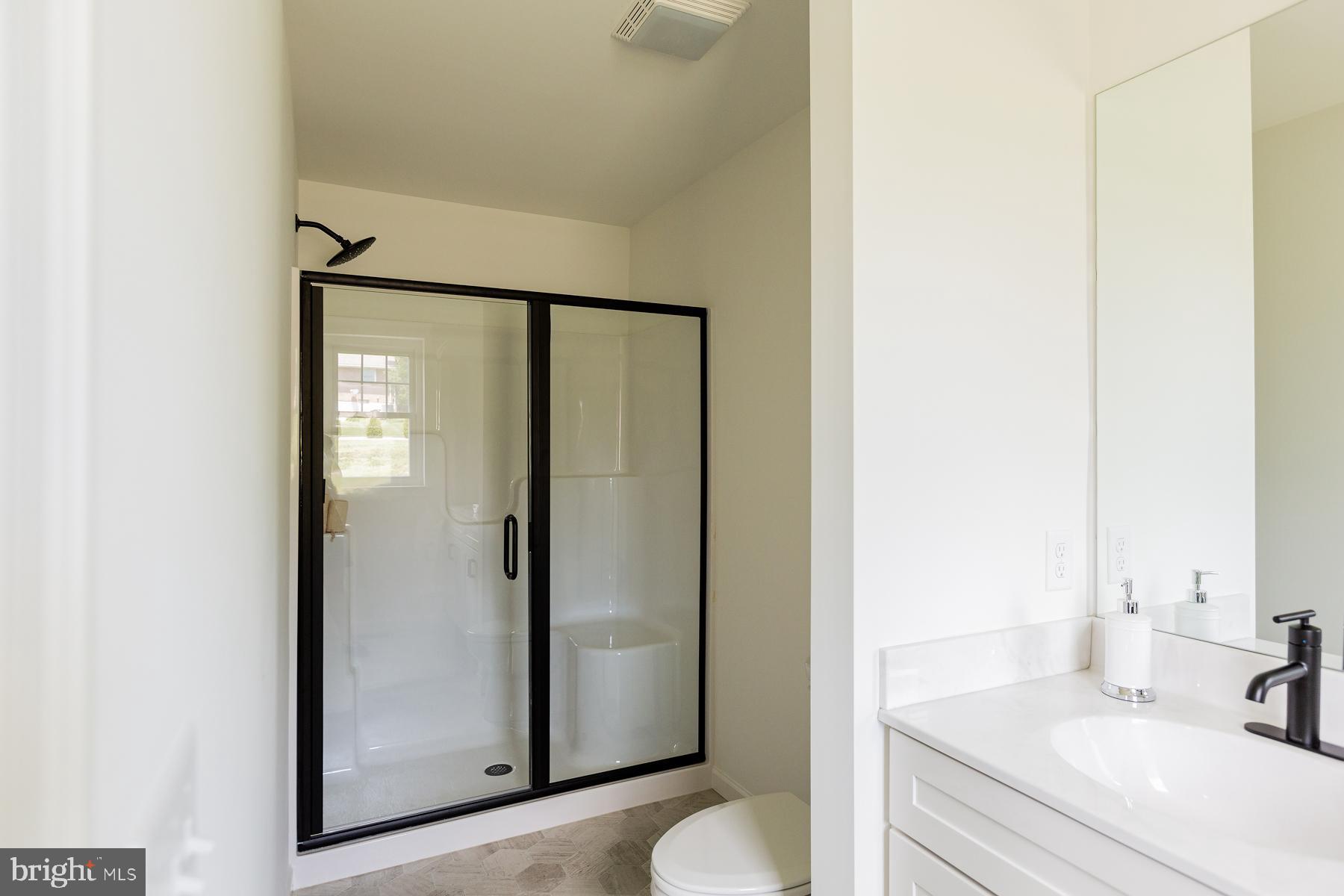 10 Ridgewood Road Quarryville, PA 17566 - Photo 30 of 48 a bathroom with a sink and a mirror