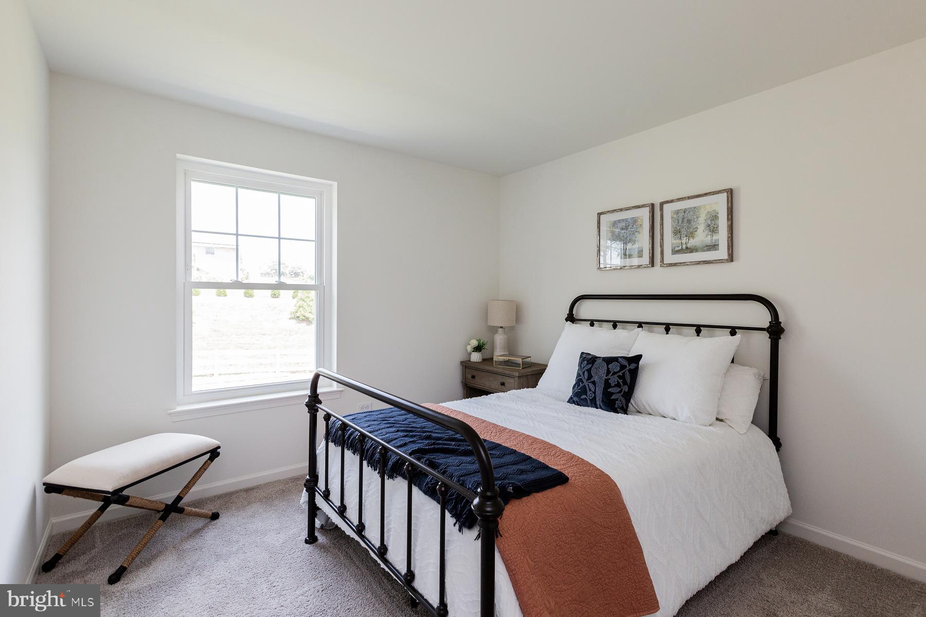 10 Ridgewood Road Quarryville, PA 17566 - Photo 33 of 48 a bedroom with a bed and a window