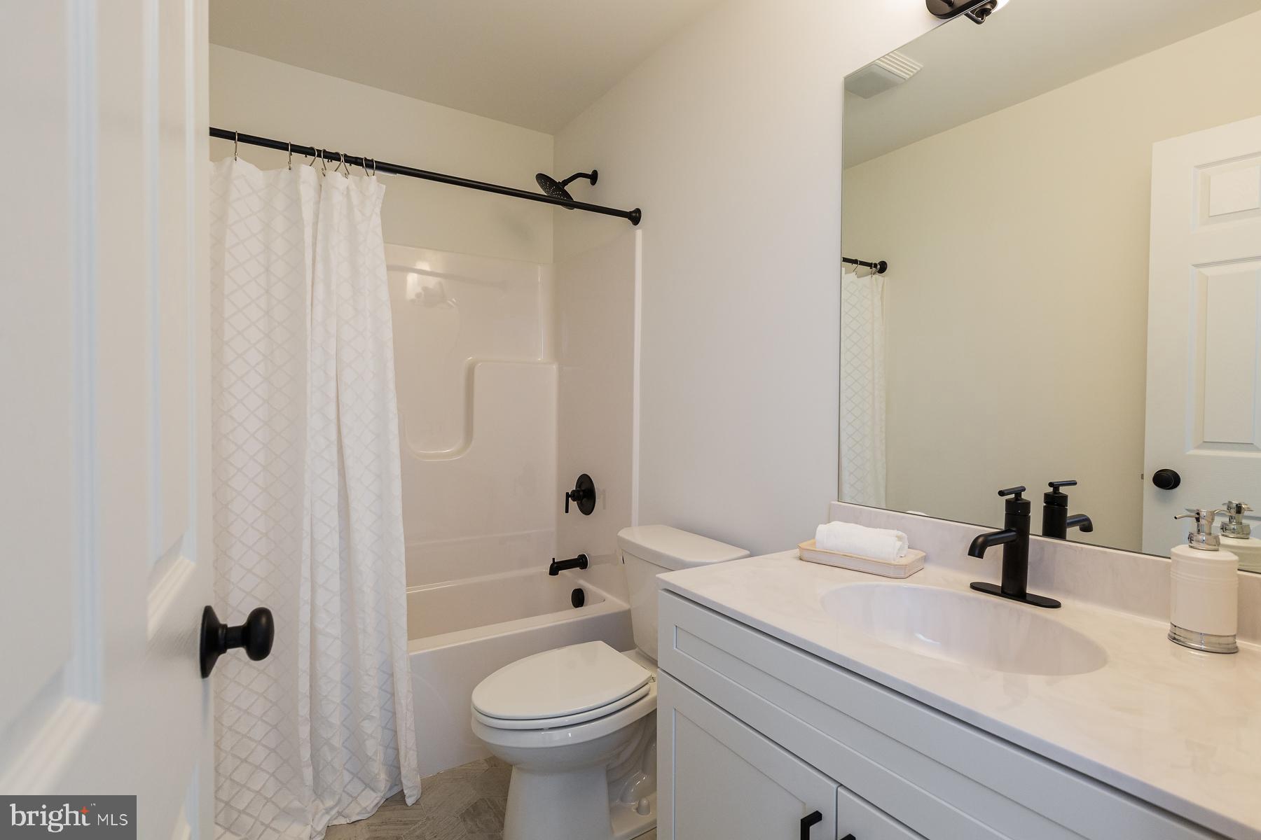10 Ridgewood Road Quarryville, PA 17566 - Photo 35 of 48 a bathroom with a sink toilet and shower