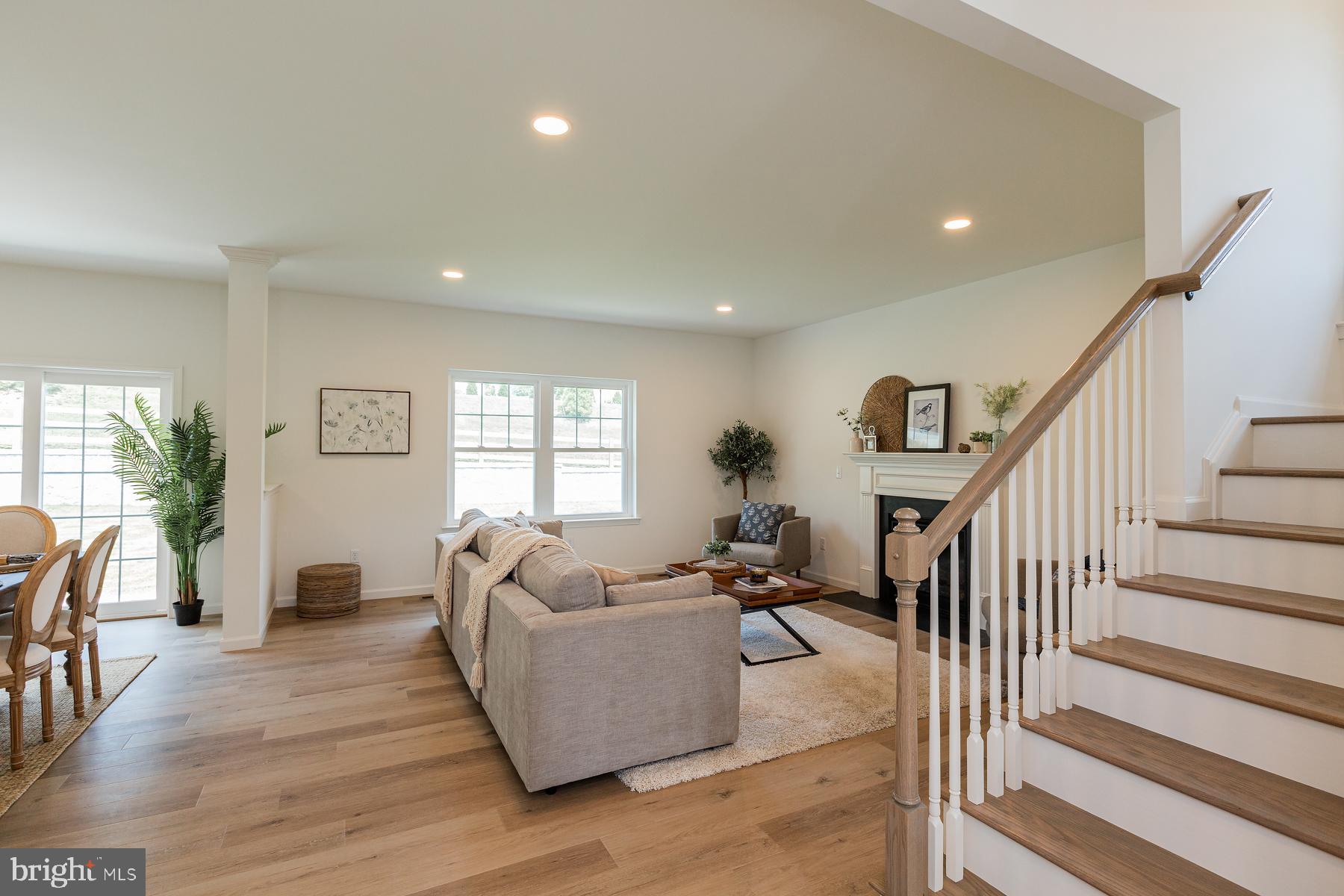 10 Ridgewood Road Quarryville, PA 17566 - Photo 9 of 48 a living room with furniture or wooden floor and a large window
