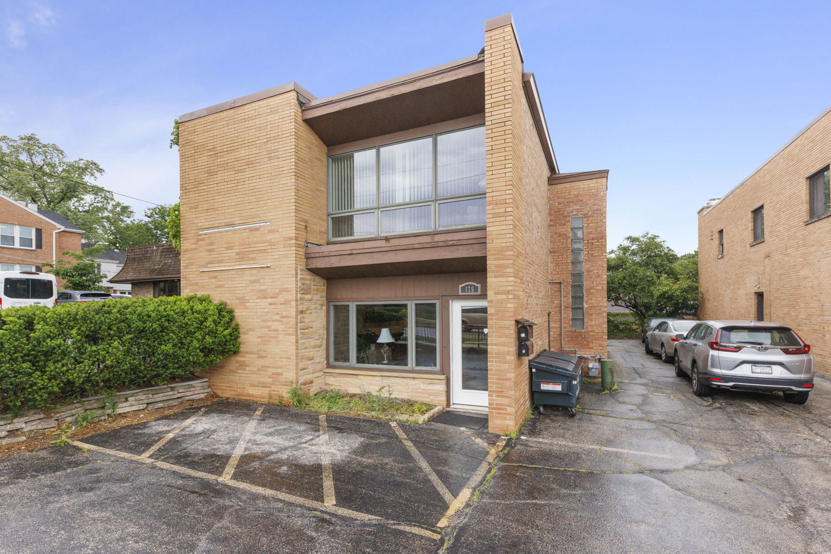 a car parked in front of a house