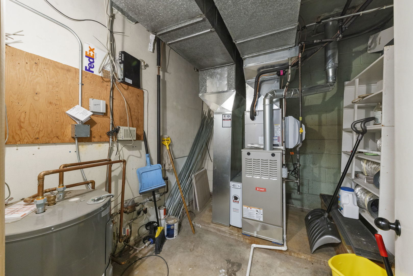 175 North Washington Street Wheaton, IL 60187 - Photo 13 of 14 a view of walk in closet with clothes and shoes