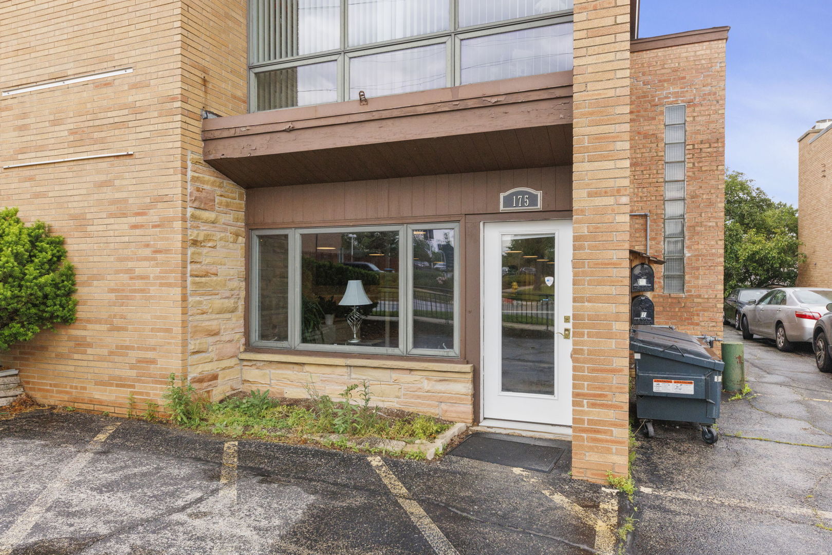 175 North Washington Street Wheaton, IL 60187 - Photo 2 of 14 a view of a house with a window and sitting area