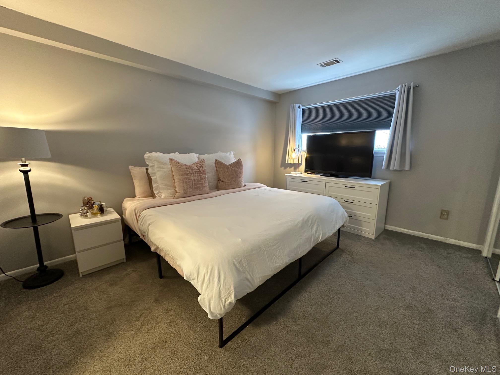 26 Cooper, Unit 510 Poughkeepsie, NY 12603 - Photo 11 of 28 Bedroom with carpet