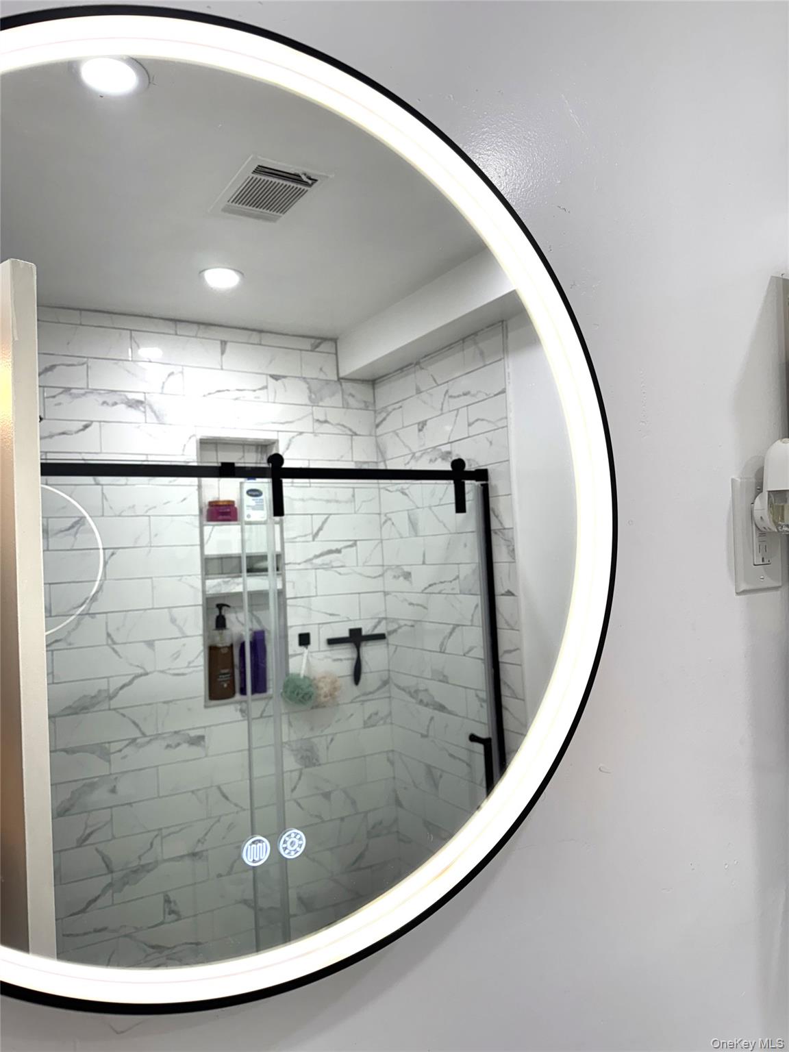 26 Cooper, Unit 510 Poughkeepsie, NY 12603 - Photo 15 of 28 Bathroom view of a stall shower and recessed lighting