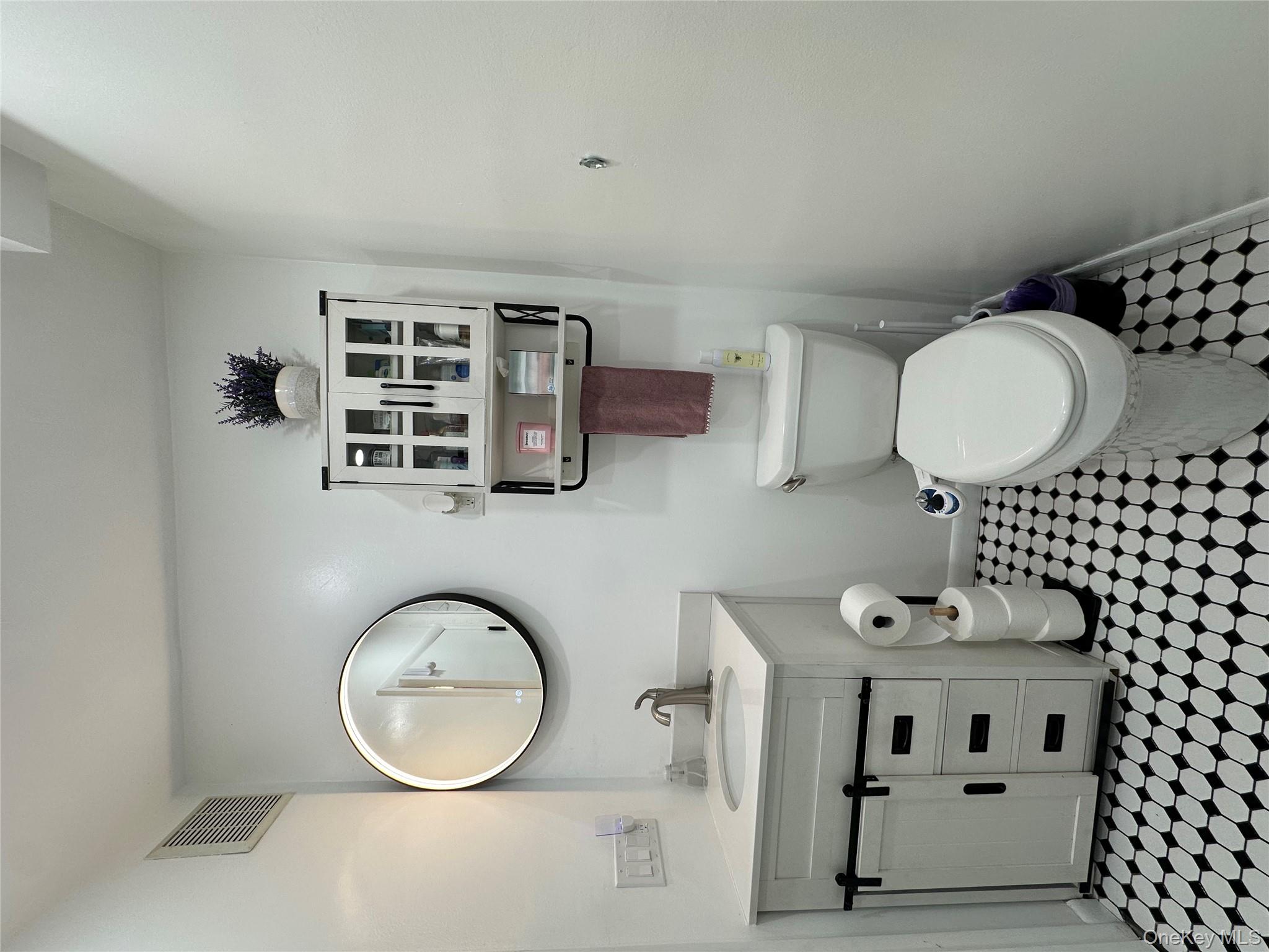 26 Cooper, Unit 510 Poughkeepsie, NY 12603 - Photo 18 of 28 Bathroom featuring vanity and light floors