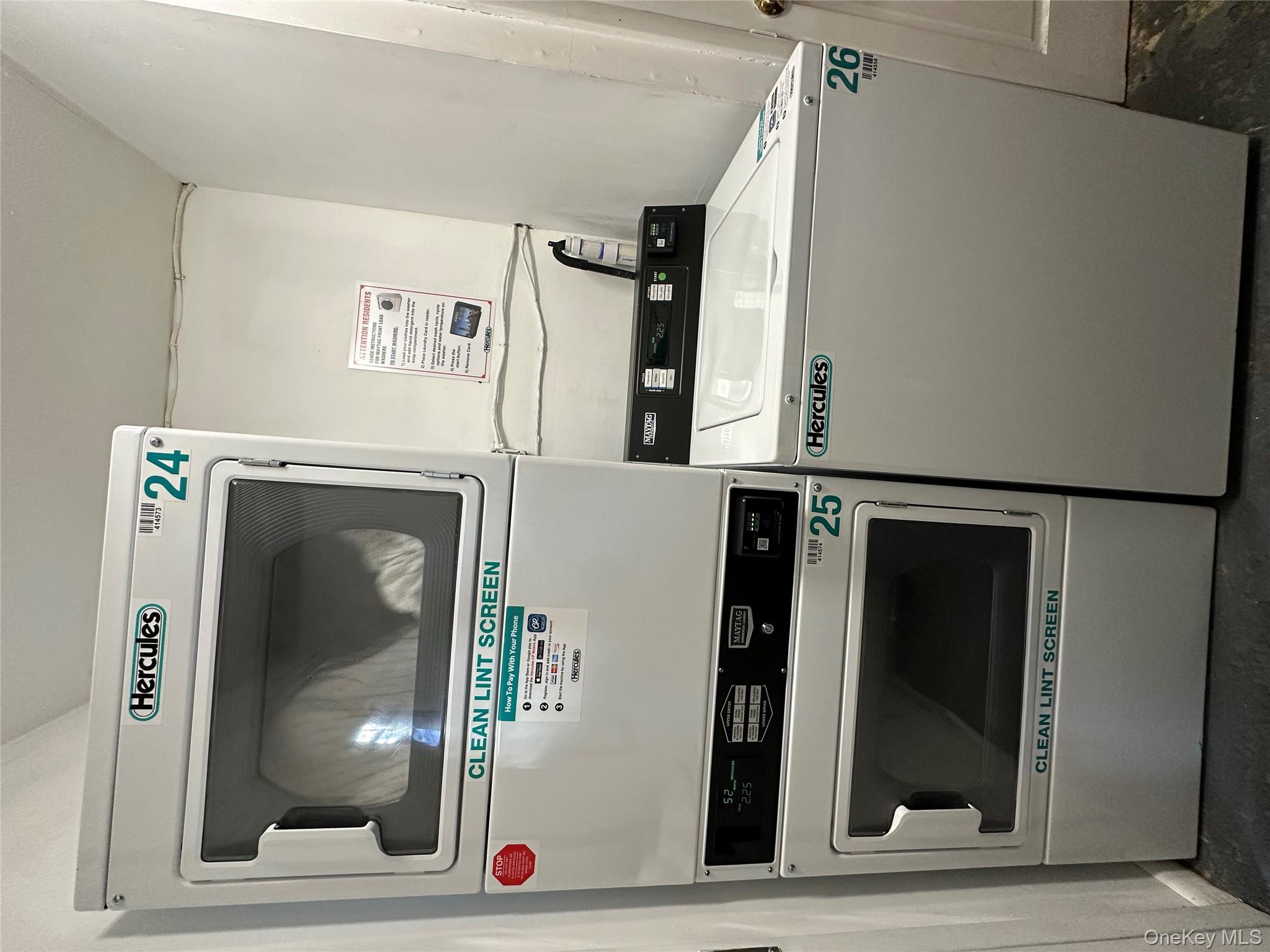 26 Cooper, Unit 510 Poughkeepsie, NY 12603 - Photo 21 of 28 Shared laundry with estacked washer and dryer and concrete floors