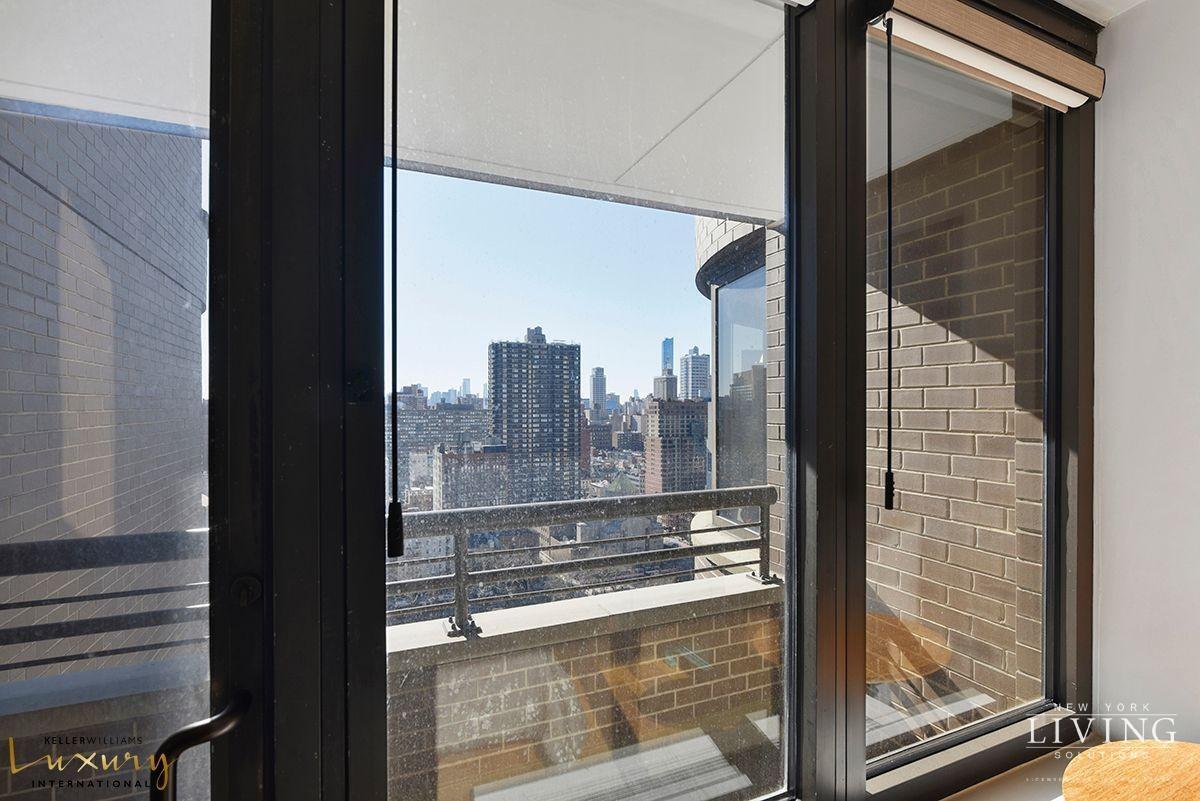 330 East 38th Street, Unit 24A Manhattan, NY 10016 - Photo 10 of 17 a view of a balcony with wooden floor