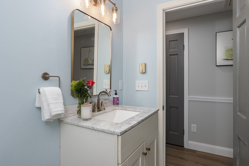 420 Pepperell Road Groton, MA 01450 - Photo 21 of 26 a bathroom with a granite countertop sink and a mirror