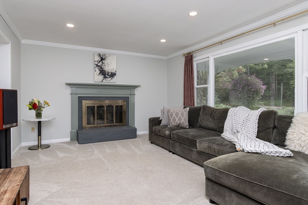 420 Pepperell Road Groton, MA 01450 - Photo 5 of 26 a living room with furniture and a fireplace