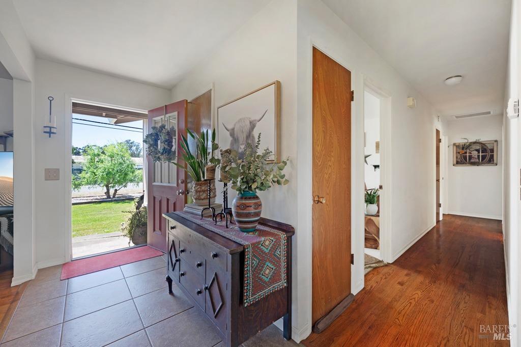 23180 Maffei Road Sonoma, CA 95476 - Photo 14 of 61 Enter to a tile entrance that opens to family room.