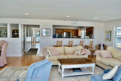 2 Bridge Avenue Bay Head, NJ 08742 - Photo 15 of 24 a living room with furniture and a flat screen tv