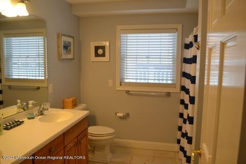 2 Bridge Avenue Bay Head, NJ 08742 - Photo 4 of 24 a bathroom with a sink a toilet and shower