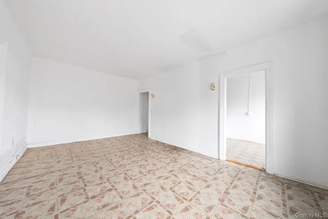 a kitchen with a stove a sink and a refrigerator
