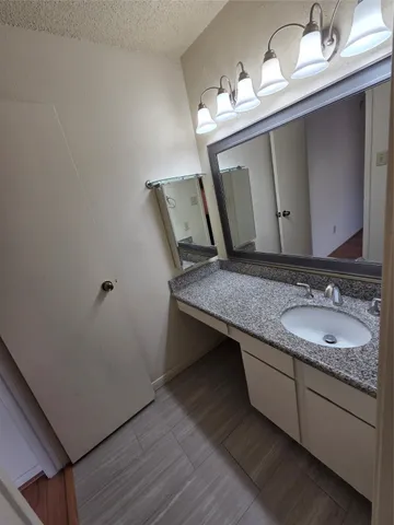 a bathroom with a toilet and a bathtub