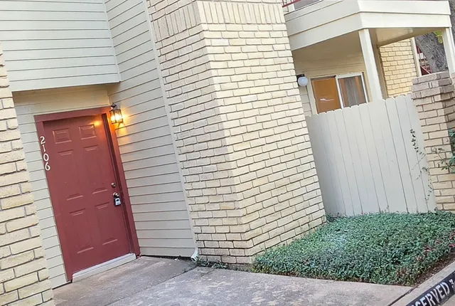 a view of a house with a white door