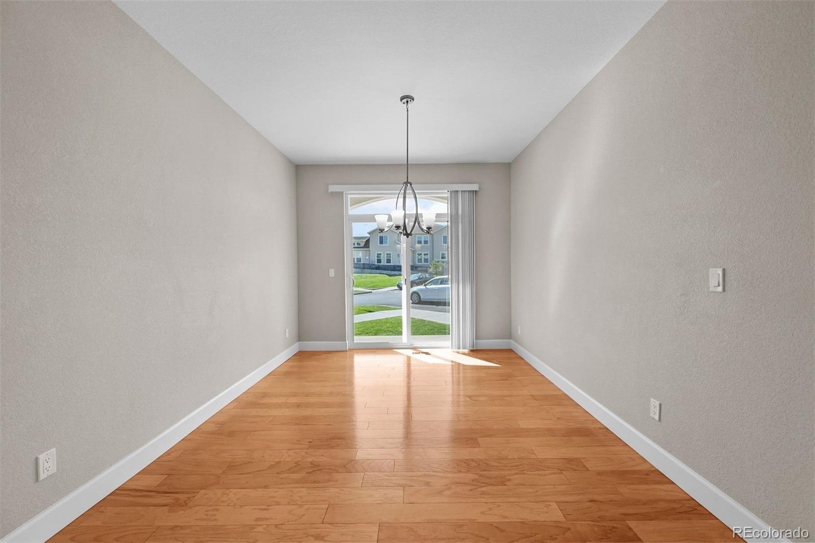 1354 Promontory Bluff View Colorado Springs, CO 80921 - Photo 16 of 45 a view of an empty room with window