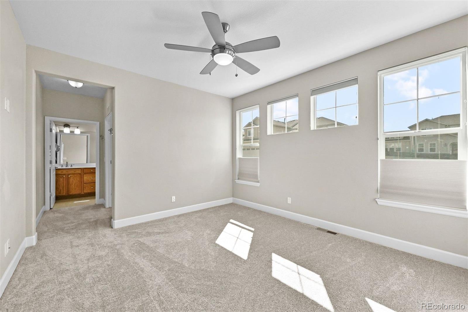 1354 Promontory Bluff View Colorado Springs, CO 80921 - Photo 19 of 45 a view of an empty room with a window
