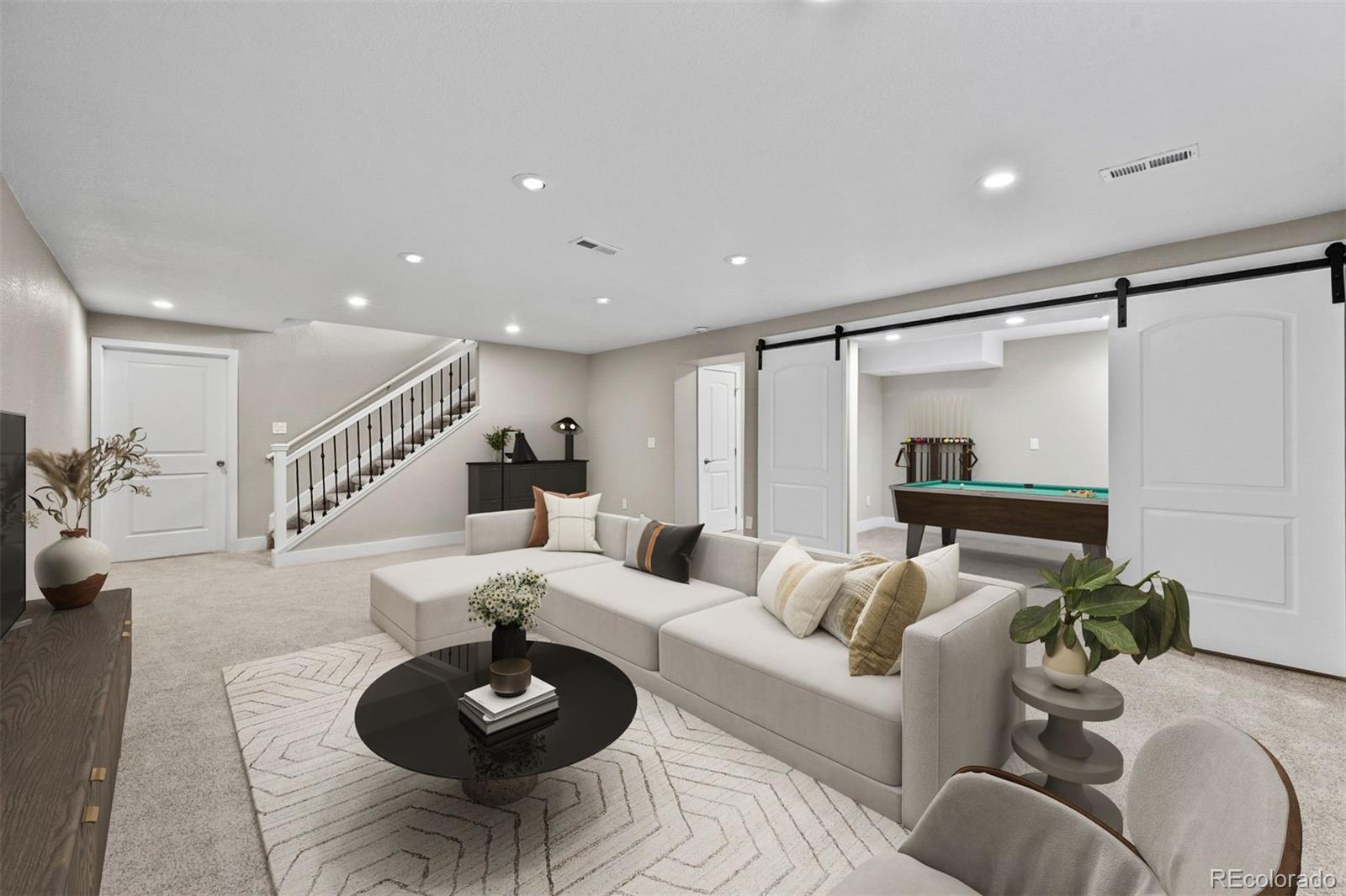 1354 Promontory Bluff View Colorado Springs, CO 80921 - Photo 27 of 45 a living room with furniture and a wooden floor