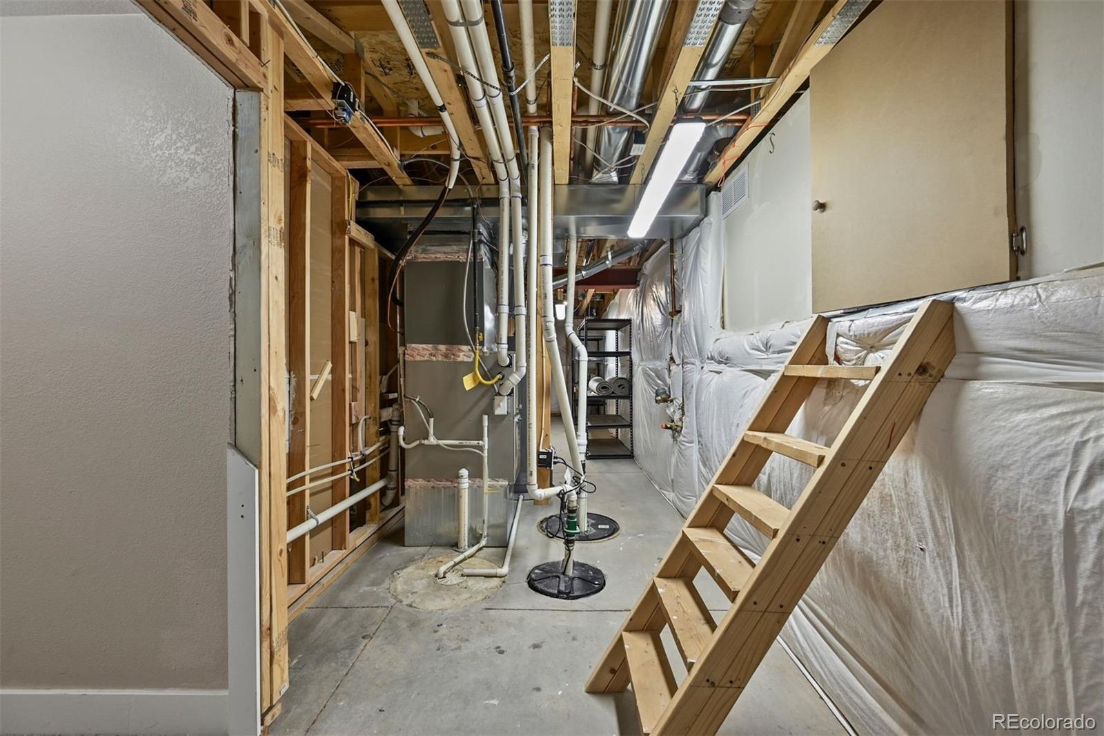 1354 Promontory Bluff View Colorado Springs, CO 80921 - Photo 33 of 45 a view of a room with gym equipment