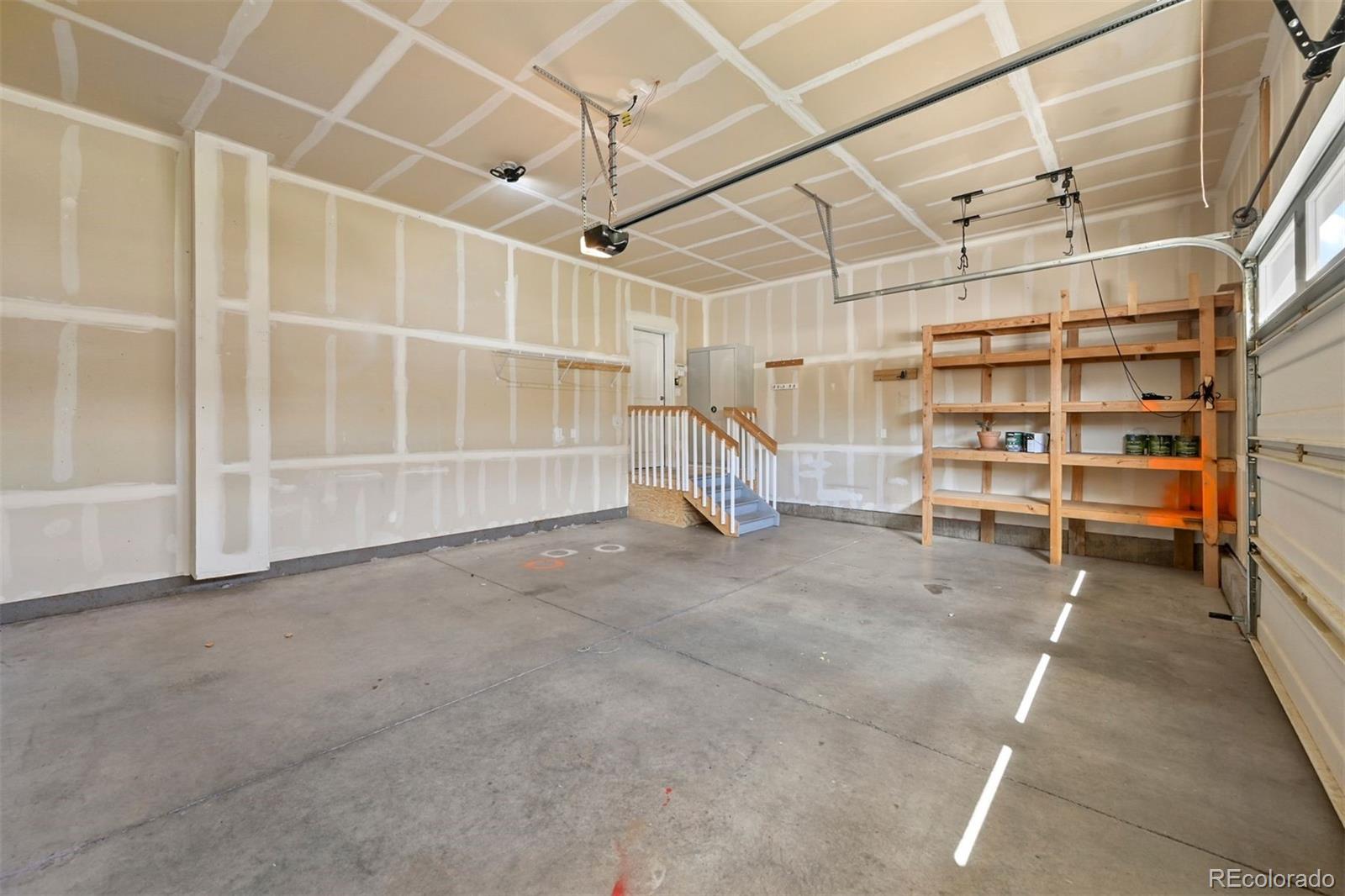 1354 Promontory Bluff View Colorado Springs, CO 80921 - Photo 34 of 45 a view of an empty room with a white walls