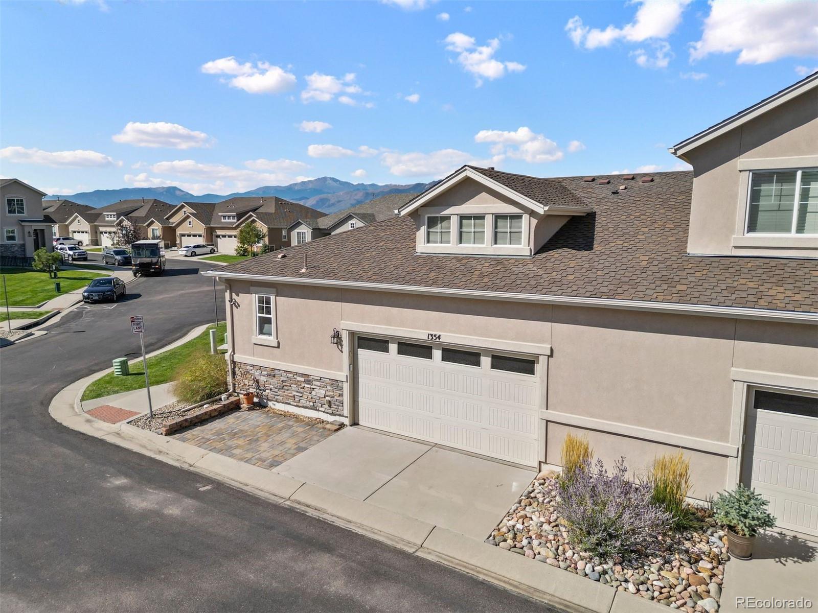 1354 Promontory Bluff View Colorado Springs, CO 80921 - Photo 39 of 45 a house view with a garden space