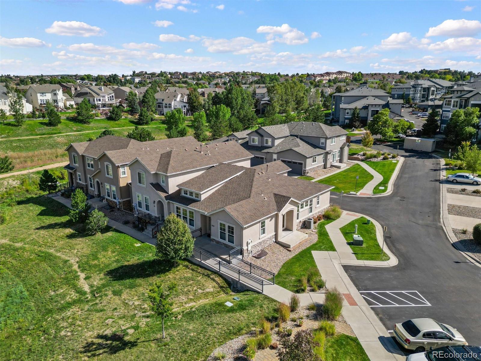1354 Promontory Bluff View Colorado Springs, CO 80921 - Photo 40 of 45 an aerial view of a house with yard swimming pool and outdoor seating