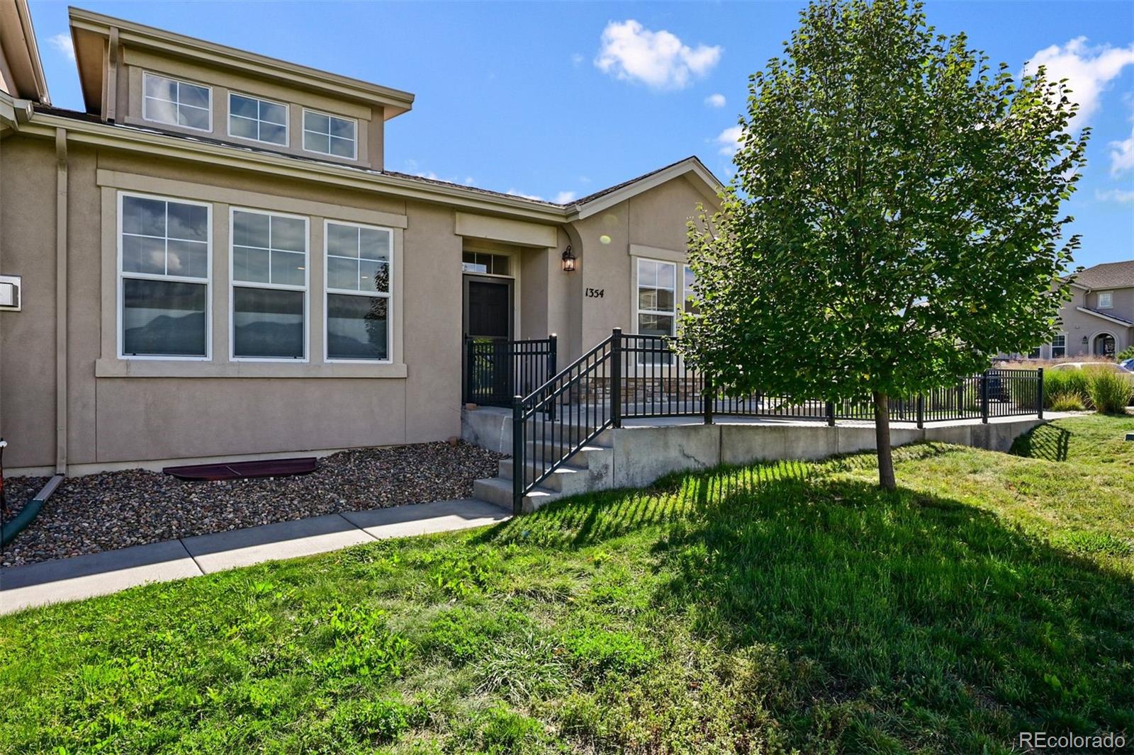 1354 Promontory Bluff View Colorado Springs, CO 80921 - Photo 8 of 45 a house view with a garden space