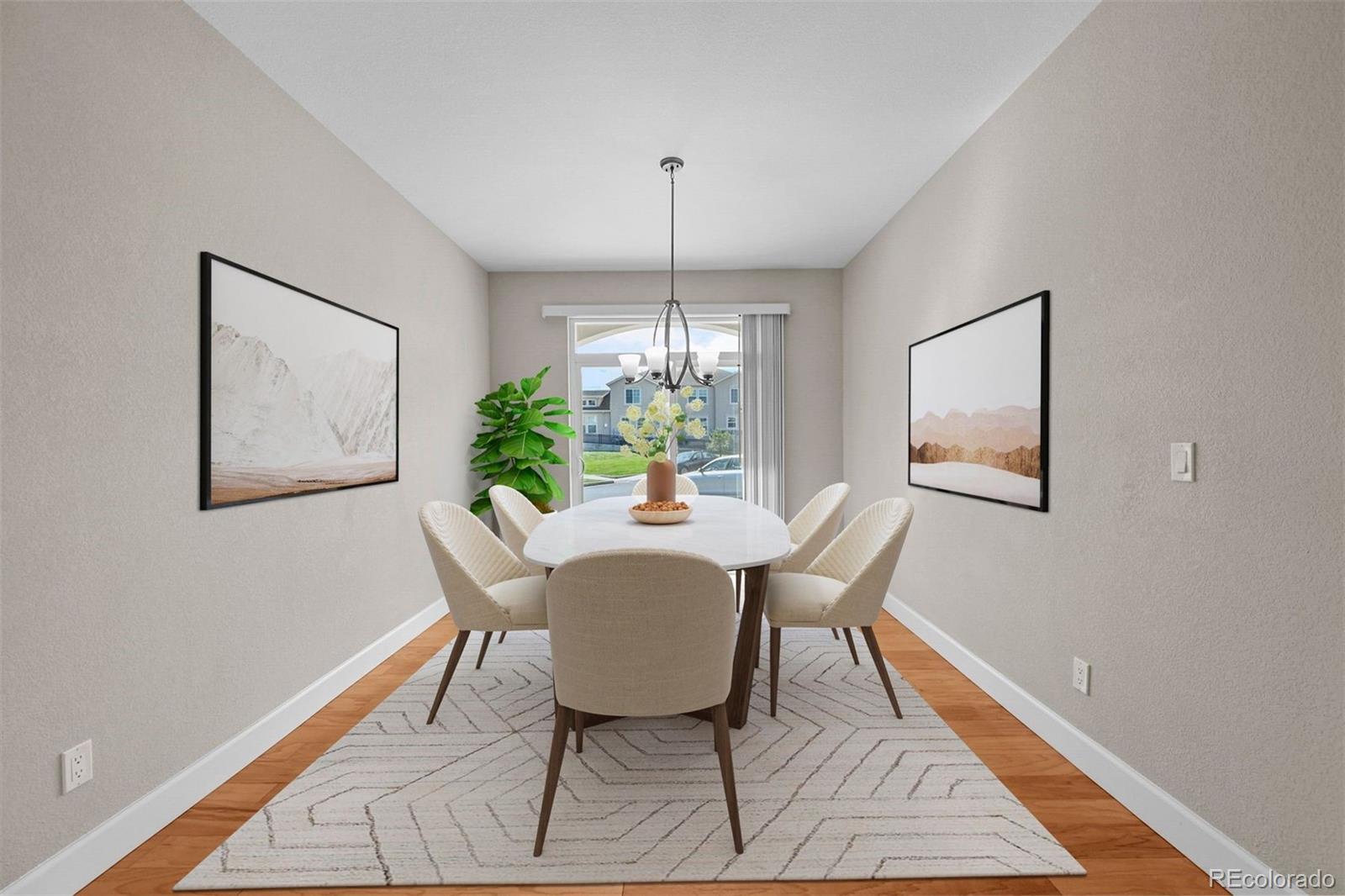 1354 Promontory Bluff View Colorado Springs, CO 80921 - Photo 10 of 45 a dining room with furniture and window