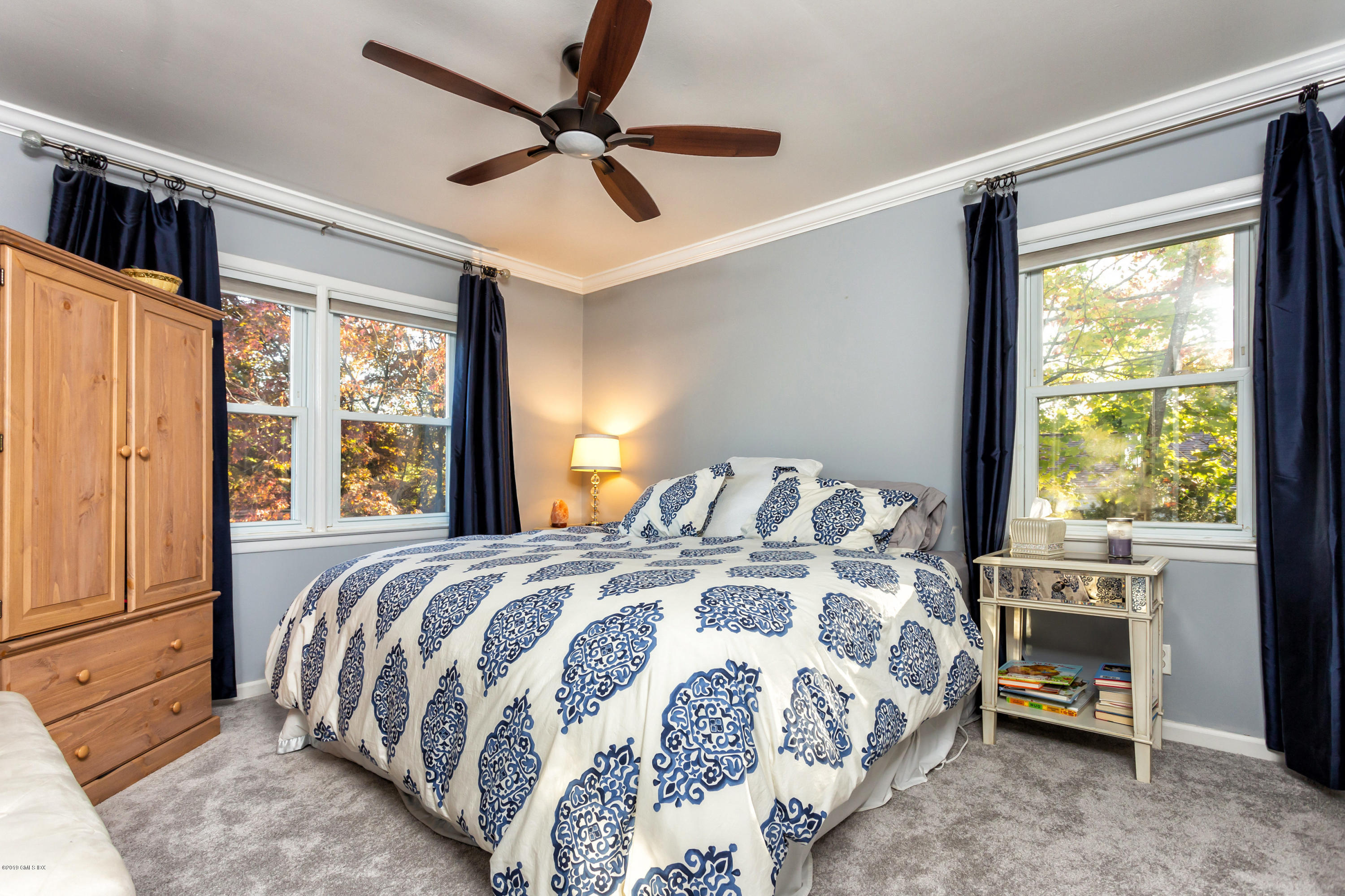 12 Mary Lane Riverside, CT 06878 - Photo 15 of 25 a bedroom with a bed and a window