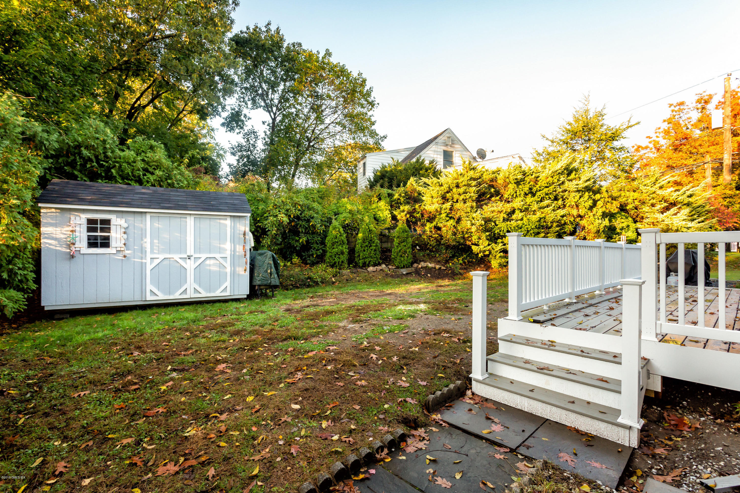 12 Mary Lane Riverside, CT 06878 - Photo 21 of 25 a view of a house with backyard