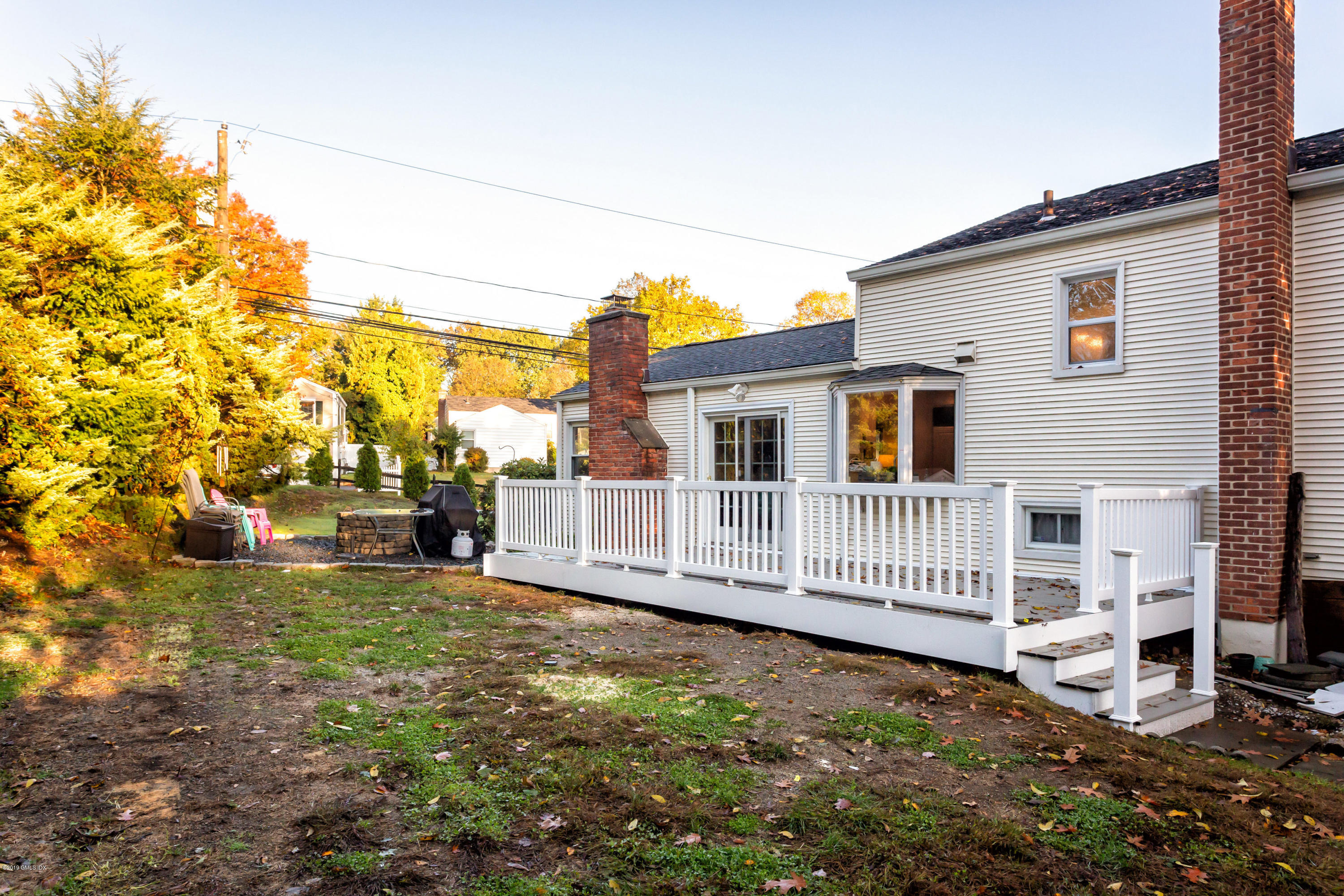 12 Mary Lane Riverside, CT 06878 - Photo 22 of 25 a view of a house with a yard