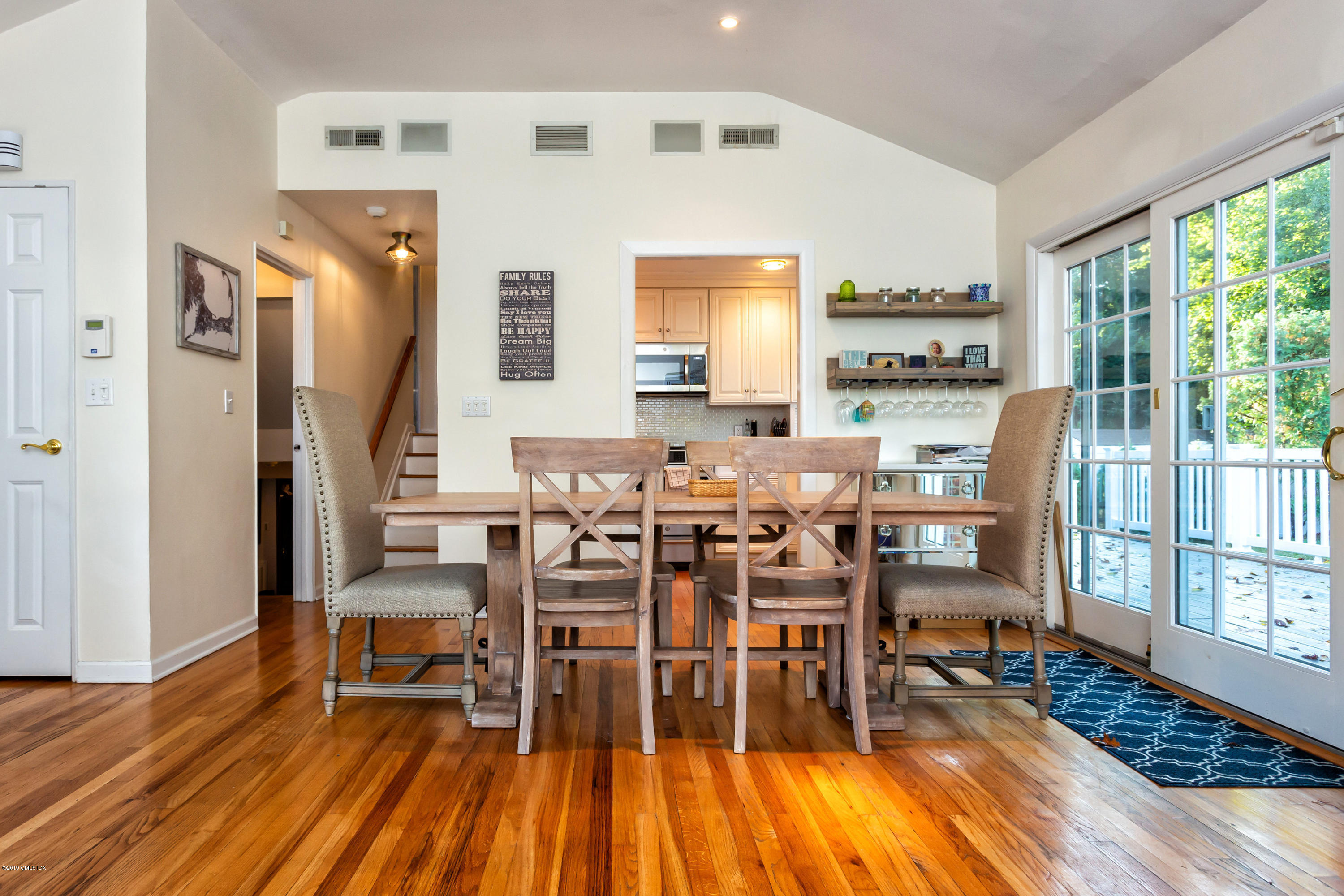 12 Mary Lane Riverside, CT 06878 - Photo 9 of 25 a dining room with furniture window and wooden floor