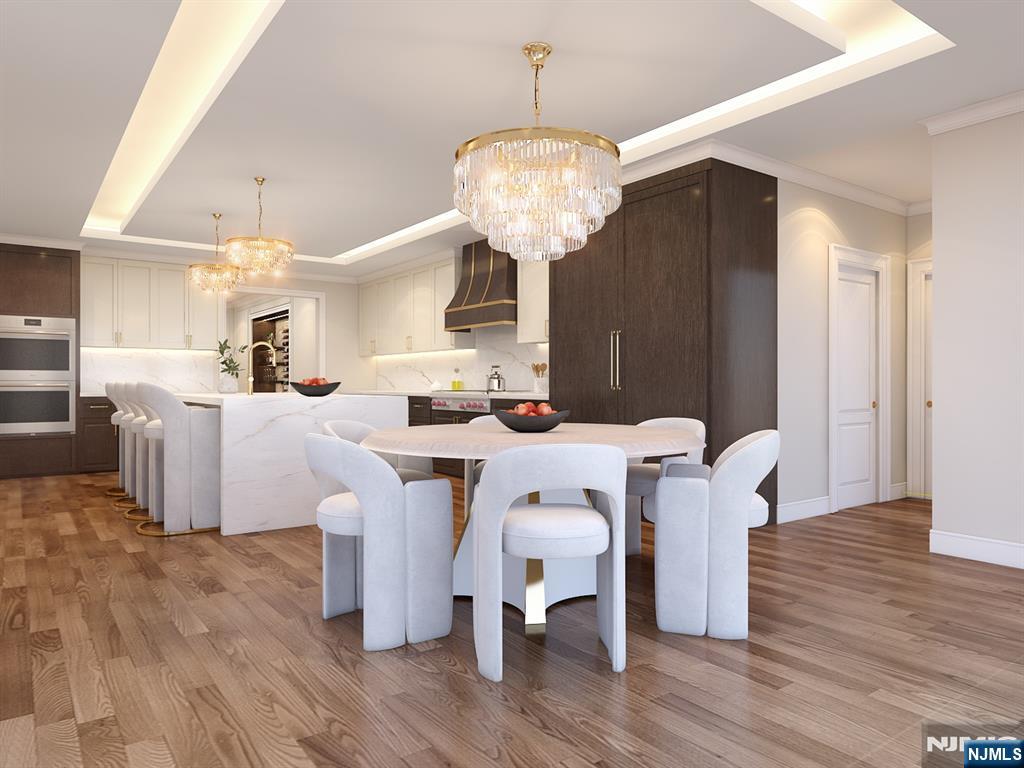 37 Roberts Road Englewood Cliffs, NJ 07632 - Photo 17 of 17 a dining room with furniture and wooden floor