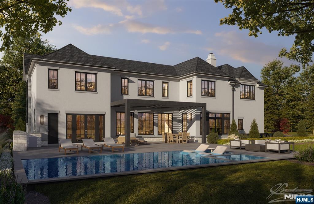 37 Roberts Road Englewood Cliffs, NJ 07632 - Photo 2 of 17 a front view of a house with garden